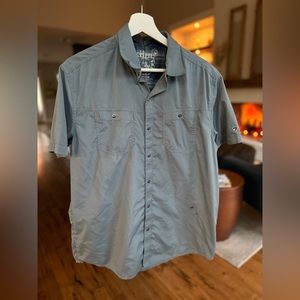 Kuhl short sleeve snap button shirt.